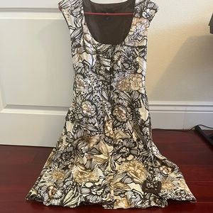 Mango MNG sleeveless dress with belt.